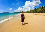 Walking along a deserted Nacpan beach close to El Nido